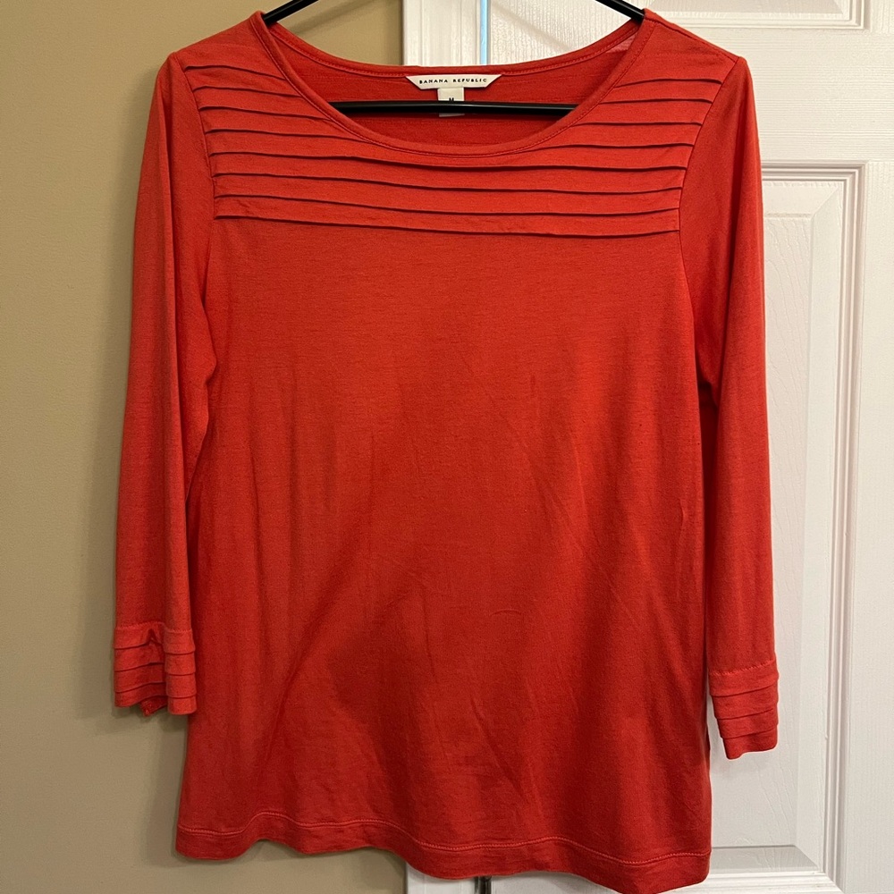 Banana Republic Size M orange shirt in good condition.